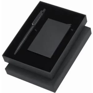 A gift set featuring a black notebook and a matching pen, presented in a sleek black box.