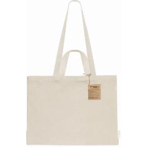 A tote bag in a light beige colour with long and short handles and a tag attached.