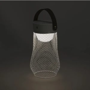 A lantern with a mesh metal design and a black handle, featuring a bright light at the top.