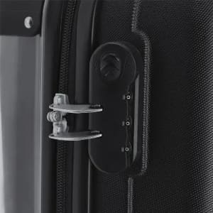A close-up of a black suitcase zipper lock, featuring a silver metal latch and a combination dial. The zipper is partially open.