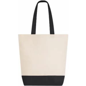 A tote bag featuring a cream upper section and a black bottom, with two black handles and a simple design.
