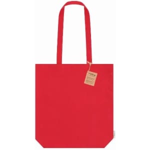 A red tote bag with long handles and a tag attached, featuring a simple design.