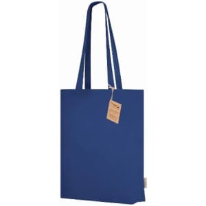 A blue tote bag with long handles and a tag attached. The bag is plain without any visible design or logo.