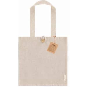 A tote bag in a light beige colour with long handles and a button closure. It features a tag attached.