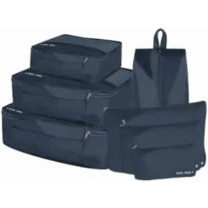 A set of navy packing cubes and pouches with zippers, designed for travel organisation.