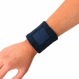 A navy blue wristband made of soft fabric with a square patch.