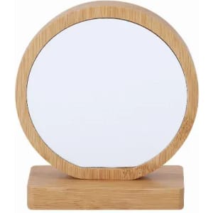 A round mirror with a bamboo frame and a wooden base, showcasing a natural finish.