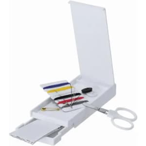 A white sewing kit featuring scissors, thread bobbins, needles, and a safety pin, all contained in a compact case.
