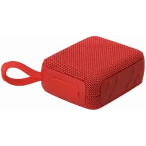 A compact red speaker with a textured surface and a carrying loop on one side.