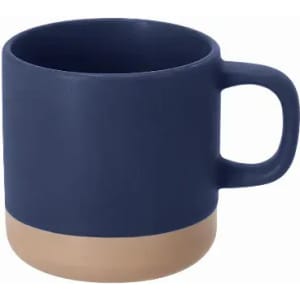 A drink mug in navy blue with a tan ceramic base and a sturdy handle. It has a matte finish.