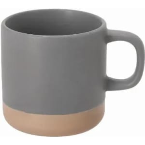 A grey ceramic mug with a light tan base and a simple handle, featuring a matte finish.