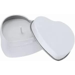 A heart-shaped candle in a white metal tin, with a simple design featuring a wick in the centre.