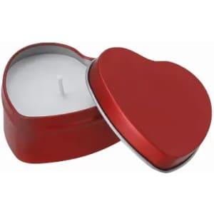 A heart-shaped candle in a red metal tin, featuring a white wax candle with a central wick.
