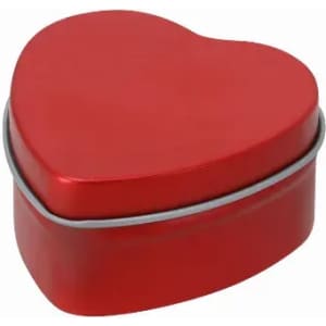 A heart-shaped tin in bright red colour with a silver rim. The lid fits securely on top.
