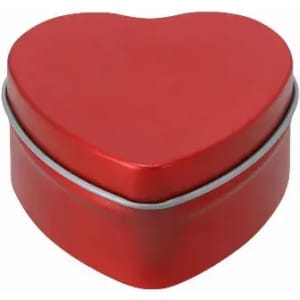 A heart-shaped tin in bright red with a silver rim. Perfect for storing small items or gifts.