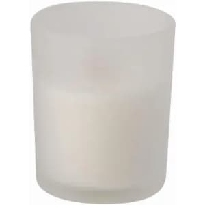 A frosted glass candle holder containing a white candle. The design is simple and elegant with a smooth finish.