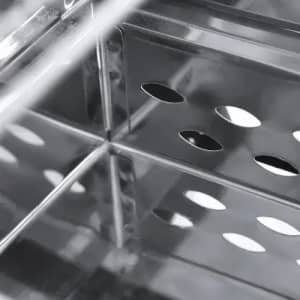 A metallic container with perforated sides, featuring multiple circular holes for ventilation.