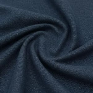 A close-up of dark blue fabric, displaying a smooth texture and folds, ideal for various textile applications.