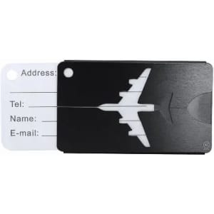 A luggage tag with a black design featuring a white airplane silhouette and space for personal information.