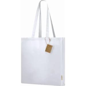 A white tote bag with two handles and a tag attached. The bag features a simple, minimalistic design.