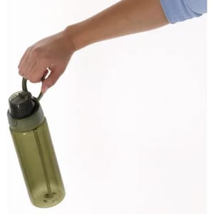 A drink bottle in olive green being held by a hand, featuring a secure handle and a black lid.