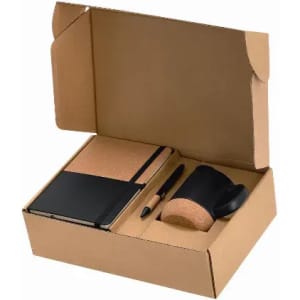 A gift box containing a cork notebook, a pen, and a black mug with a cork accent.