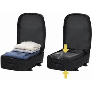 A black luggage case with a zippered compartment and folded clothes inside, featuring a dual-opening design.