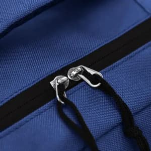 A blue bag with a zippered compartment and metal zipper pulls, featuring black accents.