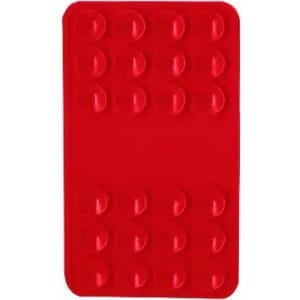 A red silicone mat featuring multiple circular moulds for baking or crafting, with a logo present.