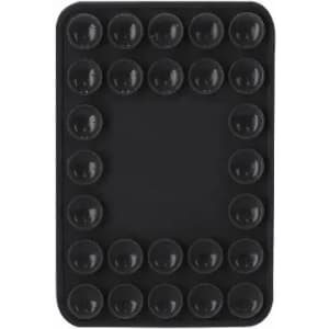 A black tray featuring 20 round depressions arranged in a grid pattern for holding items.