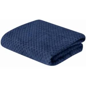 A folded navy blue blanket with a textured pattern, displayed on a white background.