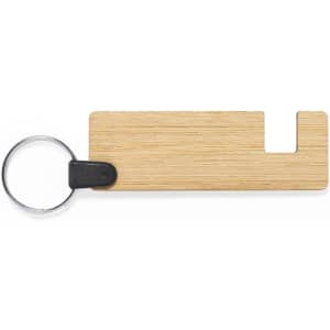 A wooden keyring with a circular metal attachment and a notch cut out of one side.