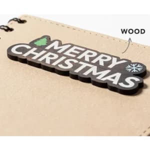 A wooden Christmas tag featuring the words "Merry Christmas" with decorative graphics.