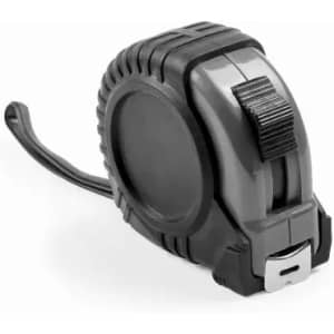 A black and grey tape measure with a sturdy casing and a retractable tape. It features a protective grip and a logo.
