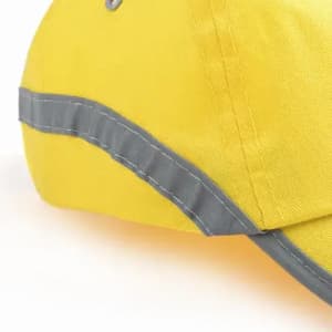 A yellow cap with grey detailing, featuring stitching along the brim. The cap has a structured design.