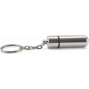A silver keychain pill holder with a cylindrical design and a chain attachment.