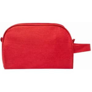 A red toiletry bag with a handle and a textured fabric surface. Features a zip closure and a simple design.