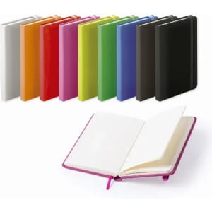 A collection of colourful notebooks in various shades, with one open notebook displaying blank pages.