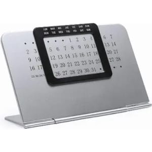 A silver perpetual calendar with a black frame displaying days and dates for the month. It has a modern design.