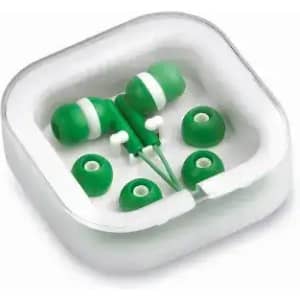 A set of green earphones with multiple ear tips displayed in a transparent case. The case has a rounded shape.