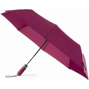 A maroon umbrella with a black handle and strap, fully opened to showcase its canopy.