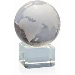A glass globe featuring a frosted design of the continents, mounted on a clear rectangular base.