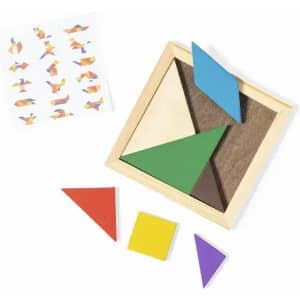 A tangram puzzle set featuring colourful geometric shapes in a wooden box, alongside a sheet with design ideas.