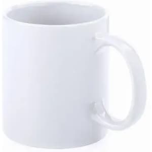 A white ceramic mug with a smooth surface and a handle, featuring a blank design.