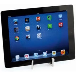 A tablet on a stand displaying various app icons on a blue background. The device is black with a white stand.
