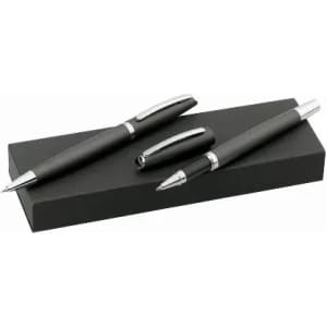 A set of three black pens with silver accents displayed on a black rectangular base.