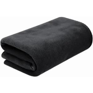 A folded black fleece blanket with a soft texture, displayed neatly for viewing.