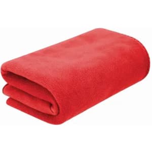A red, folded blanket made from soft fabric, featuring a smooth texture and simple design.