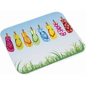 A colourful mouse pad featuring vibrant flip flops hanging on a clothesline against a blue sky and grassy background.