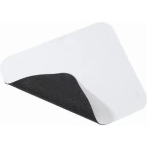 A triangular white and black product with a curved edge, featuring a textured underside.